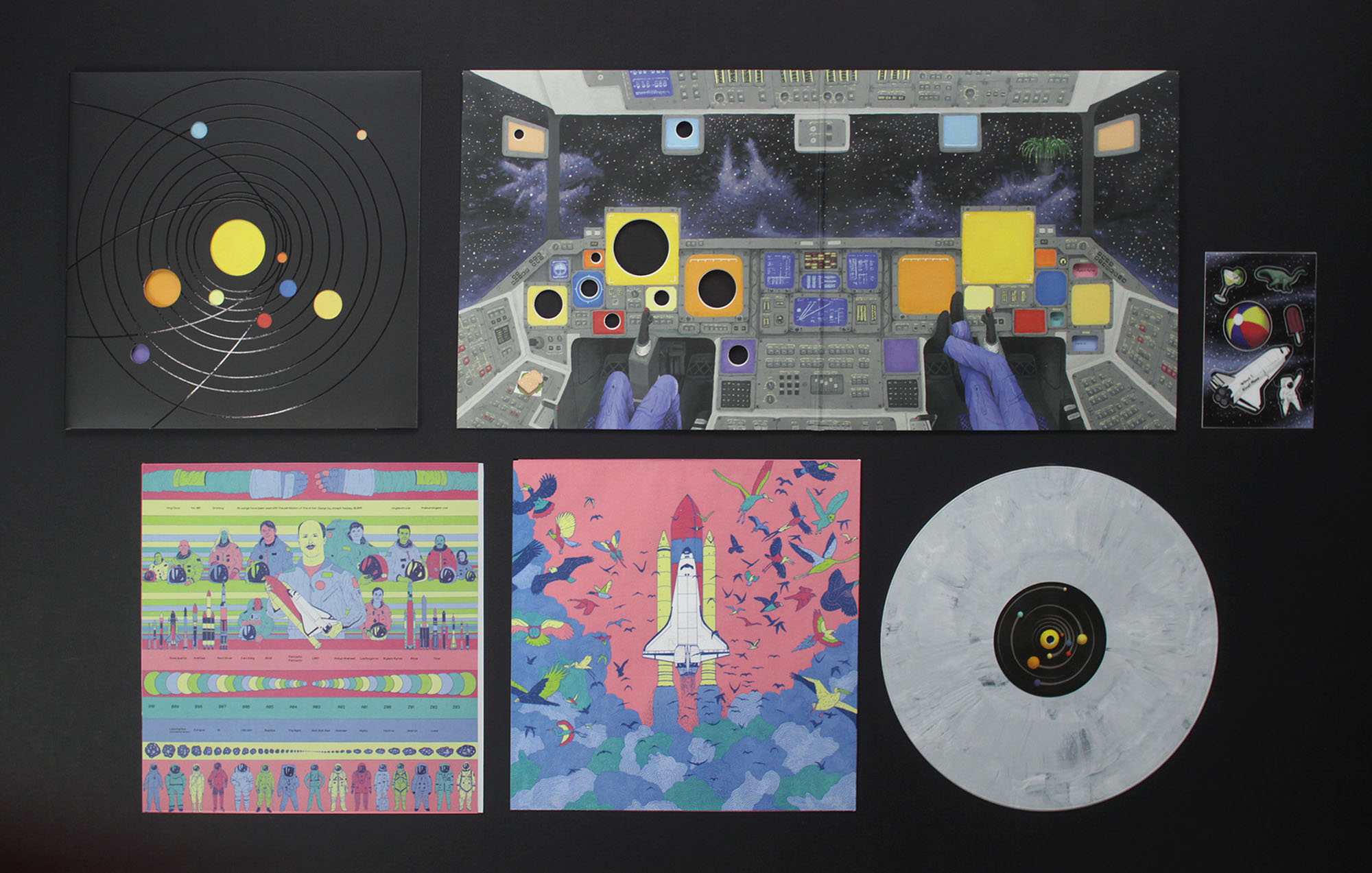 a photo with small colorful illustration all space themed 