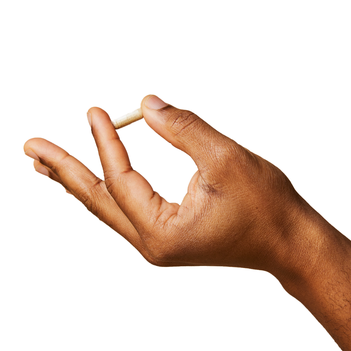 Hand holding a prescription pill for UTI, BV or yeast infection treatment