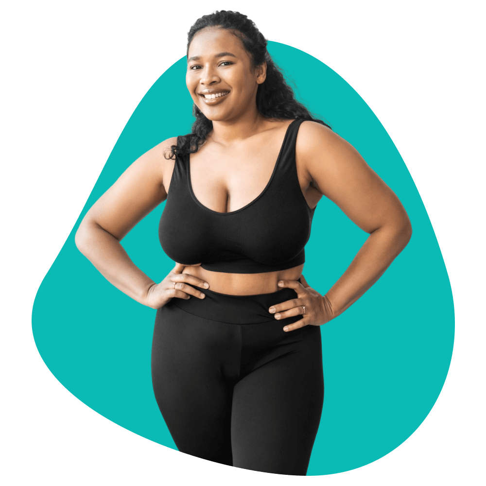 Smiling woman in workout attire.