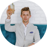 picture of a male raising a glass for a toast