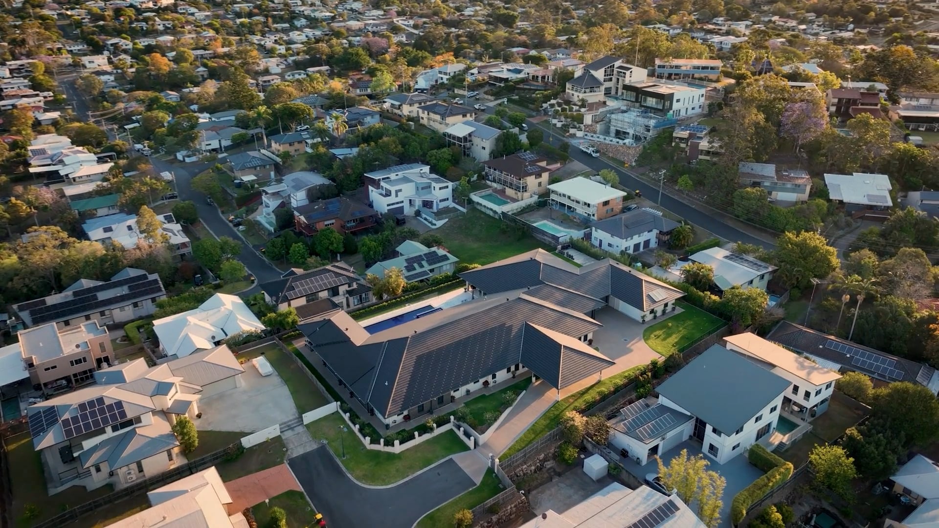 Aerial view of Australian homes featuring Volt solar roof systems.