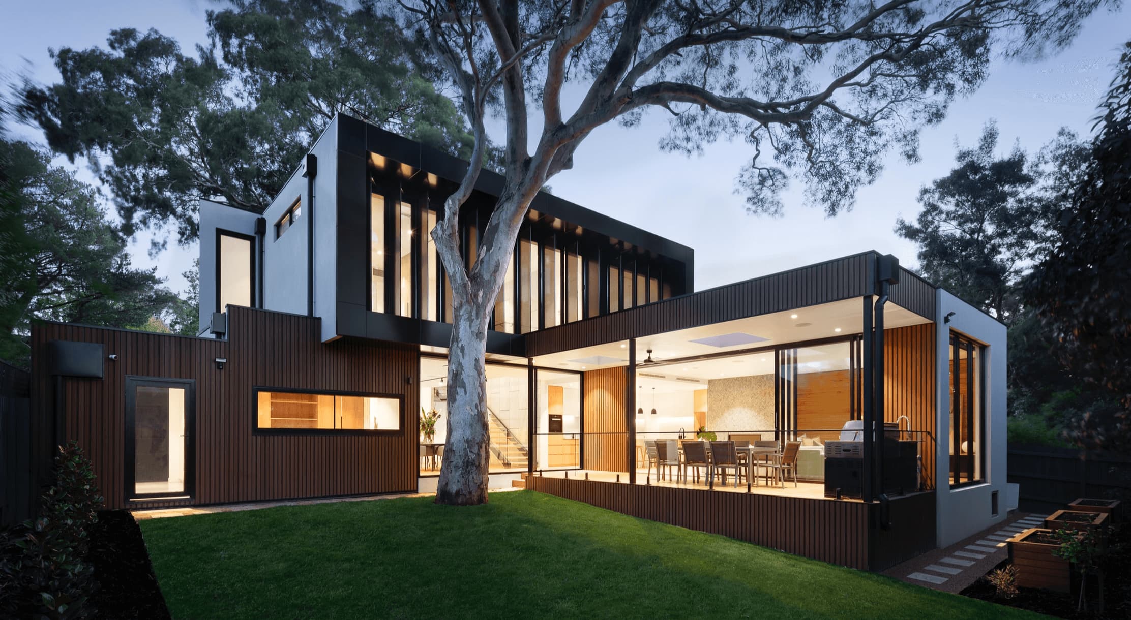 modern house with the large patio and garden