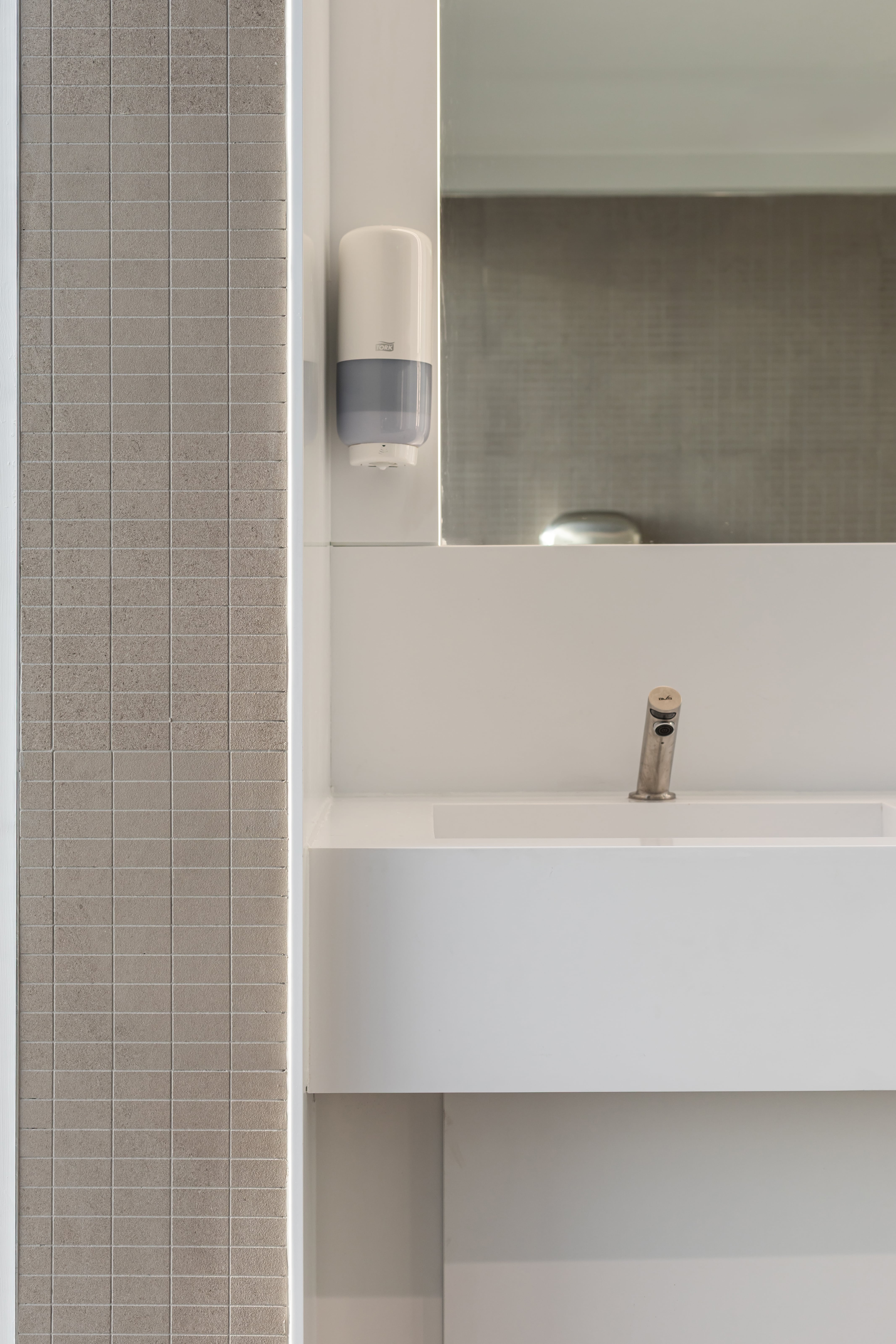 Aerial view of building extension overlooking pitch.