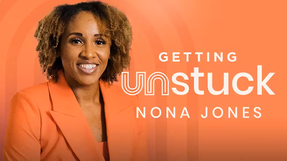 Smiling woman with curly hair wearing an orange blazer next to text reading 'Getting unstuck Nona Jones' on an orange background.