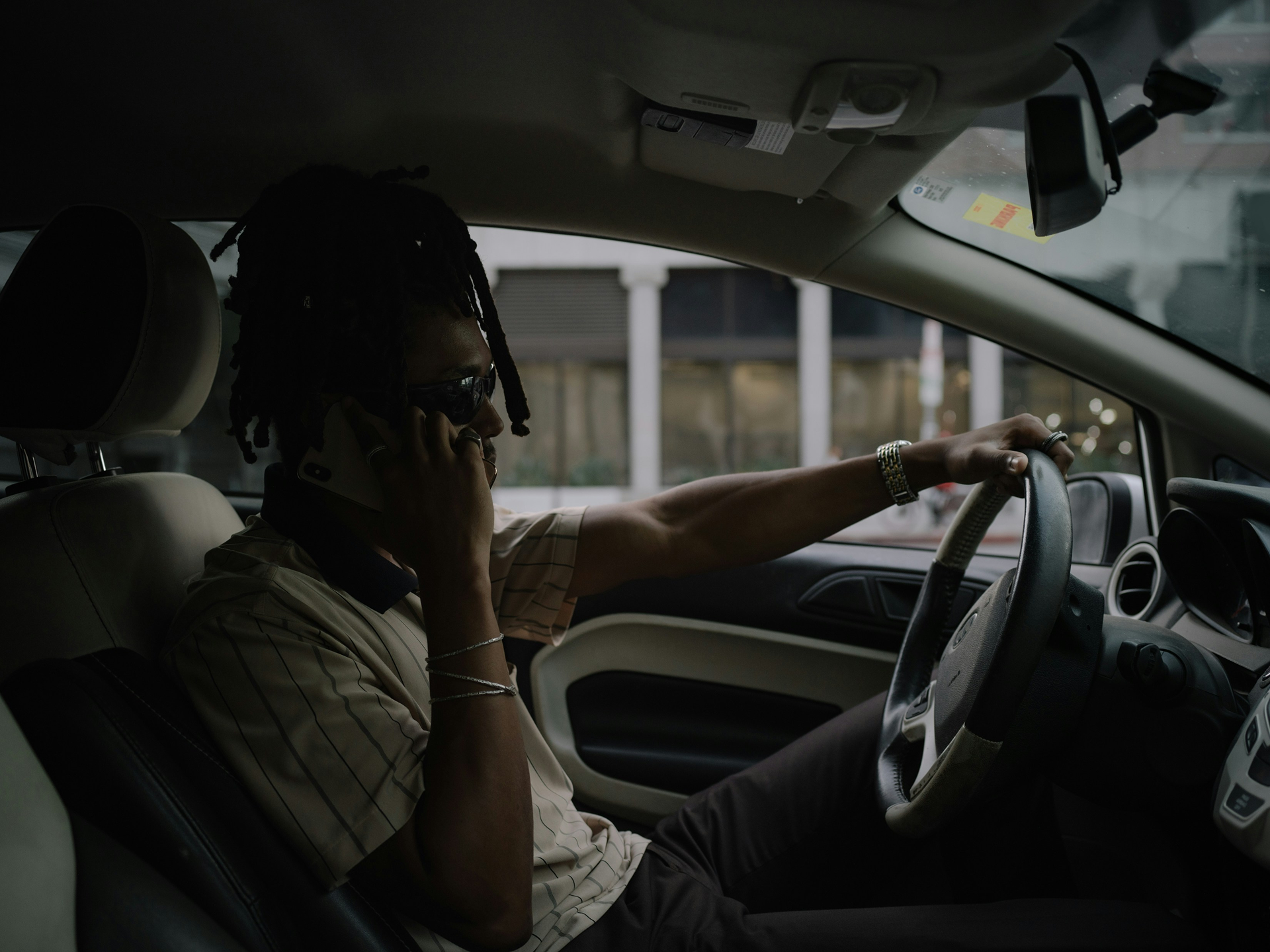 Man on the phone in car