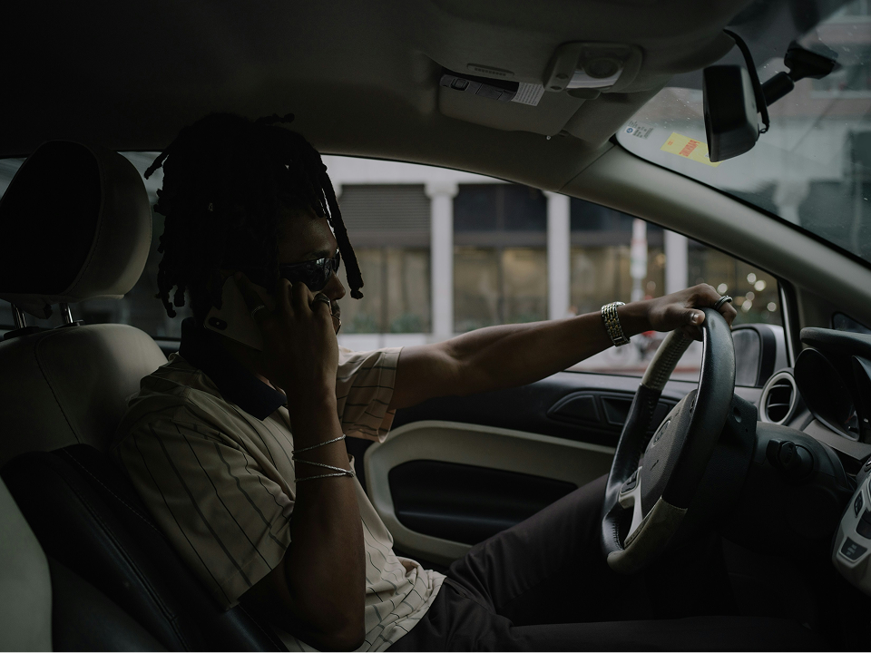 Man on the phone in car
