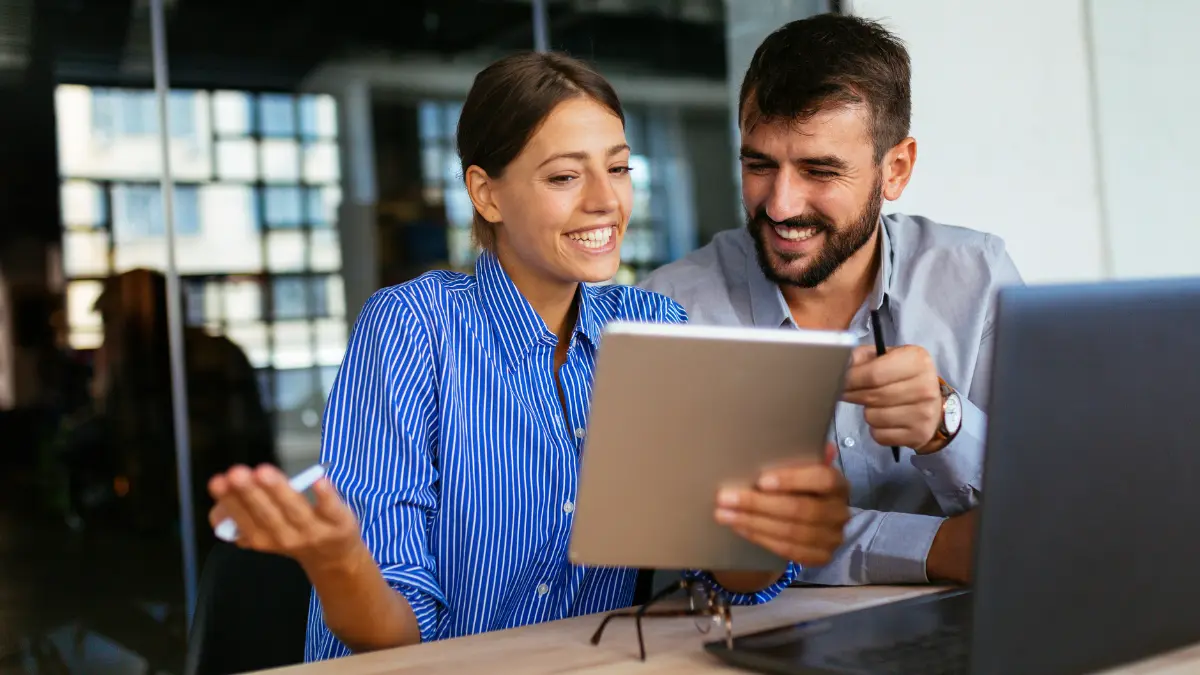 Two HR leaders working together to score an RFP for a benefits broker.