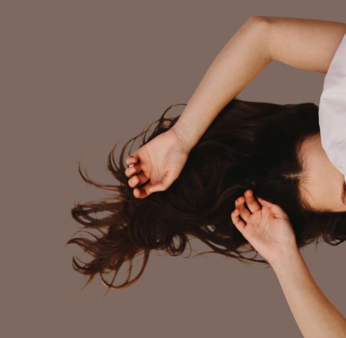 Image d'une femme dans son lit