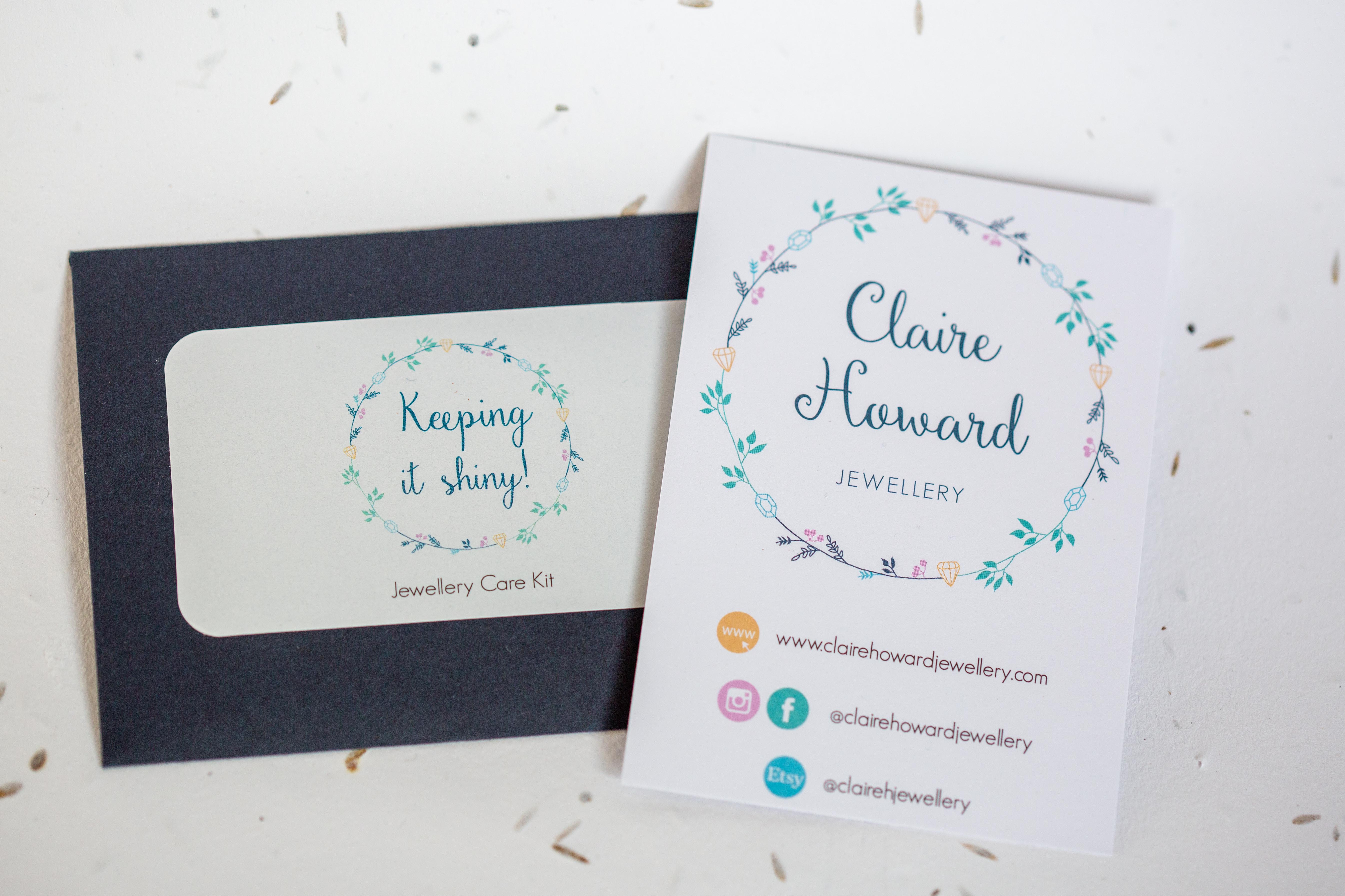 polishing cloth in navy blue envelope with care label