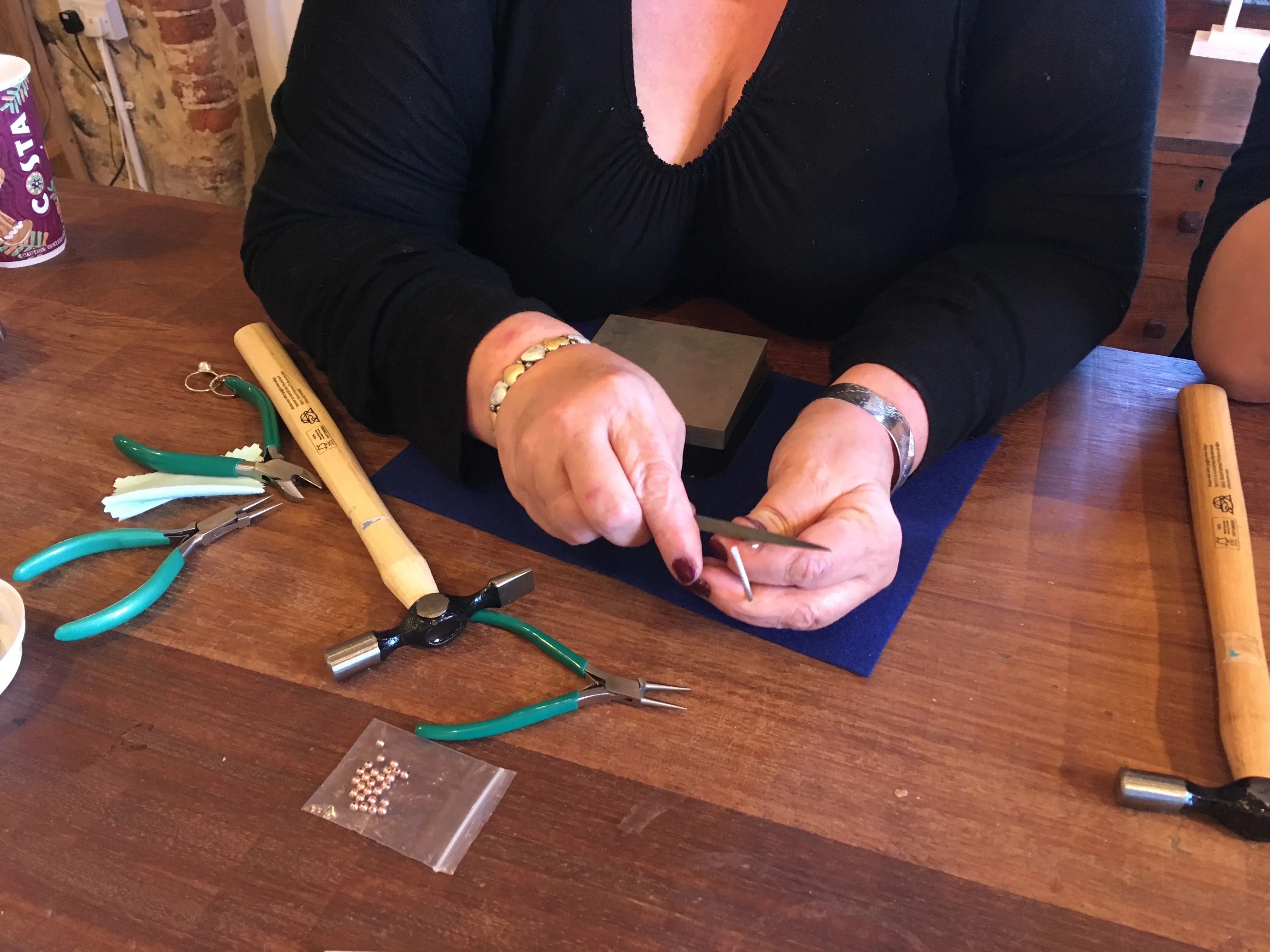 filing whilst making pearl ring