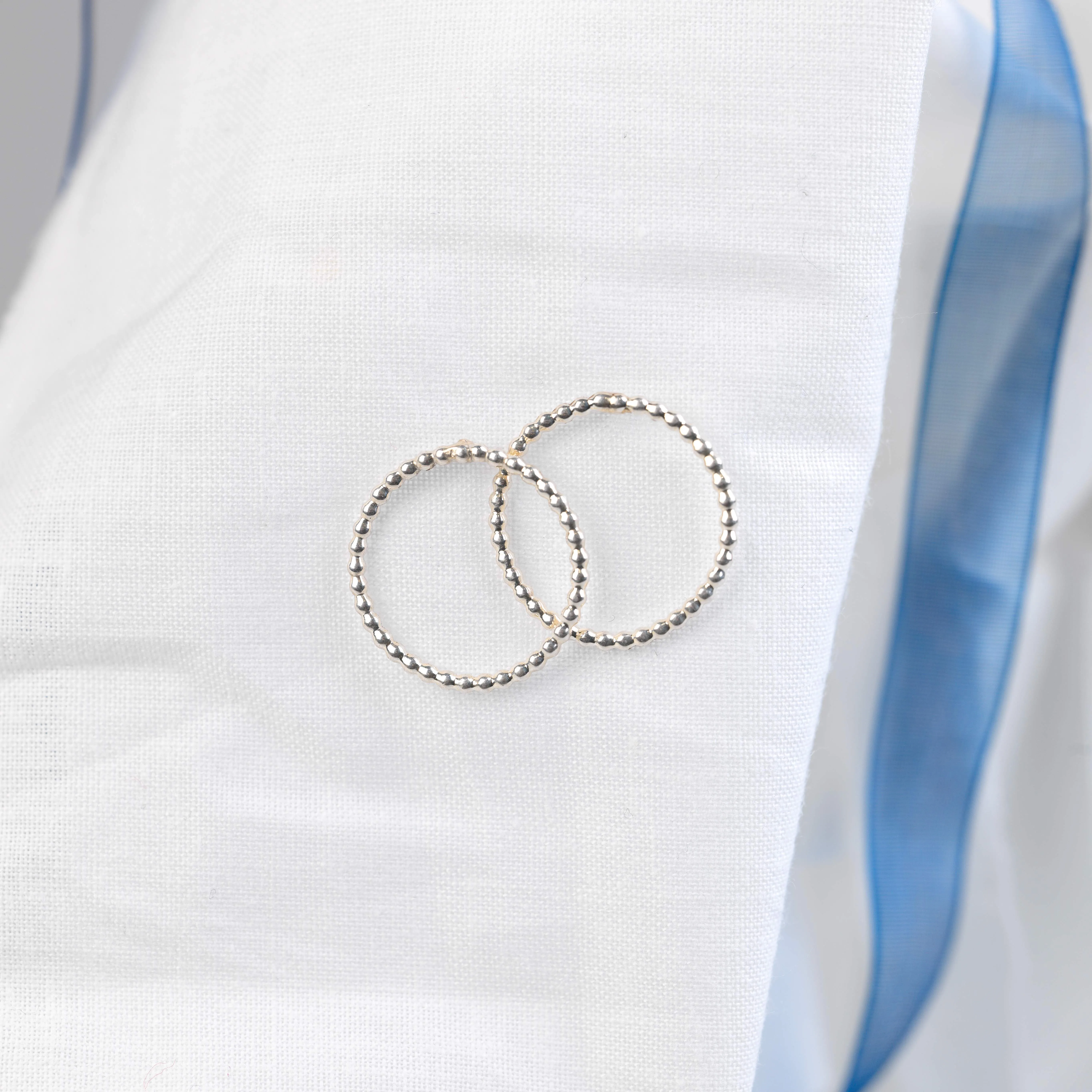 silver beaded hoop stud earrings with white jewellery box tied with blue ribbon