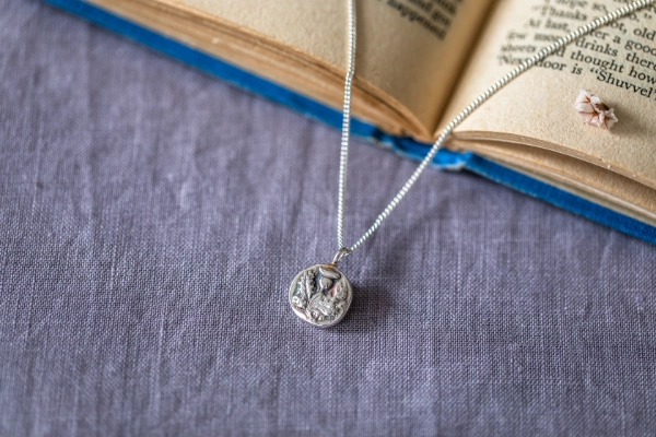 Handmade silver thistle button necklace cast from a vintage button. A handcrafted sterling silver necklace inspired by Scotland.
