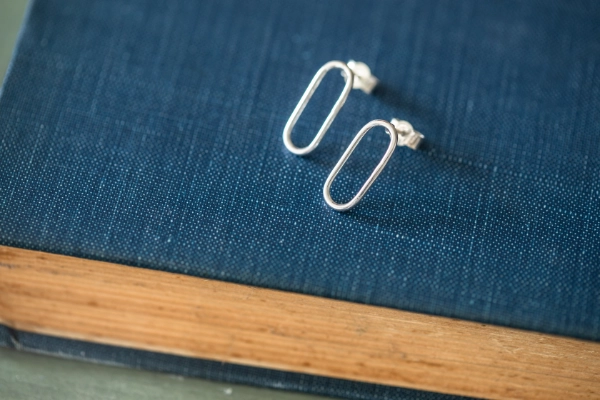 Handmade sterling silver paperclip stud earrings with individually formed links. Contemporary, easy-to-wear jewellery handmade in North Norfolk.