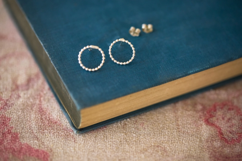 Handmade sterling silver beaded hoop stud earrings with a delicate textured finish. Simple little silver circles for easy everyday wear.
