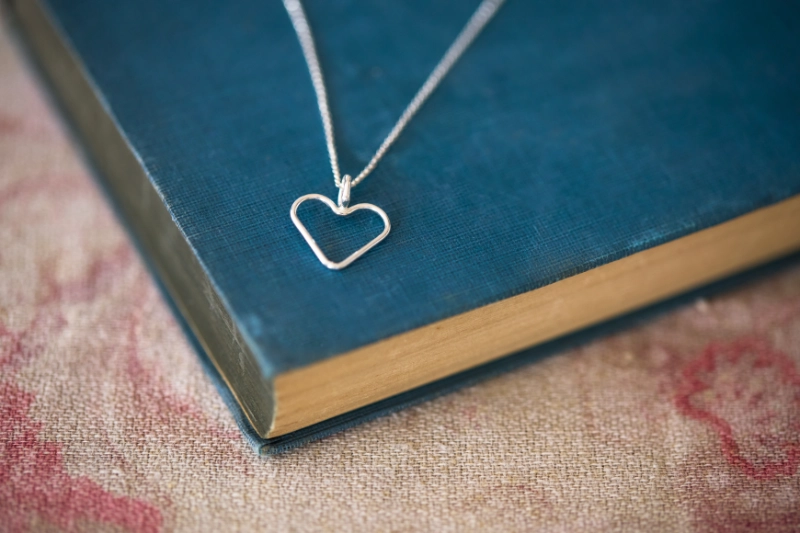Handmade sterling silver open heart necklace on an 18-inch chain. A simple, meaningful little heart made in North Norfolk.