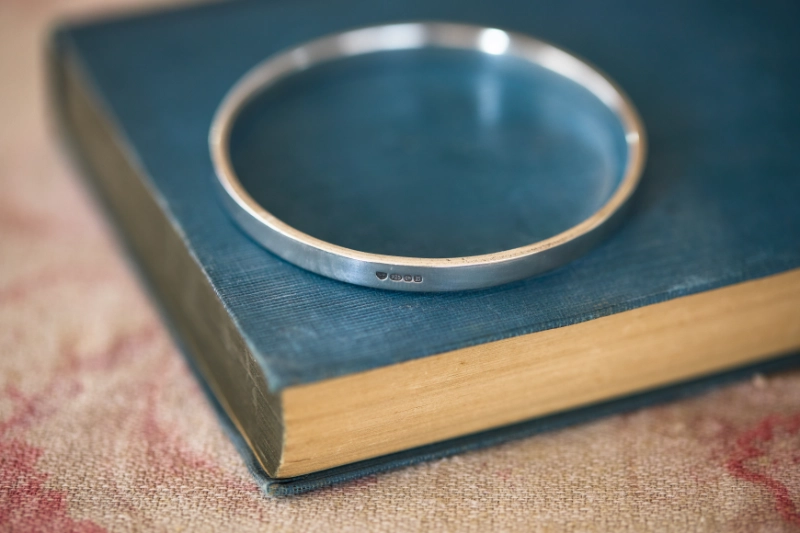 Handmade 5mm sterling silver bangle, personalised with your own engraved words inside or outside and hallmarked in Birmingham.