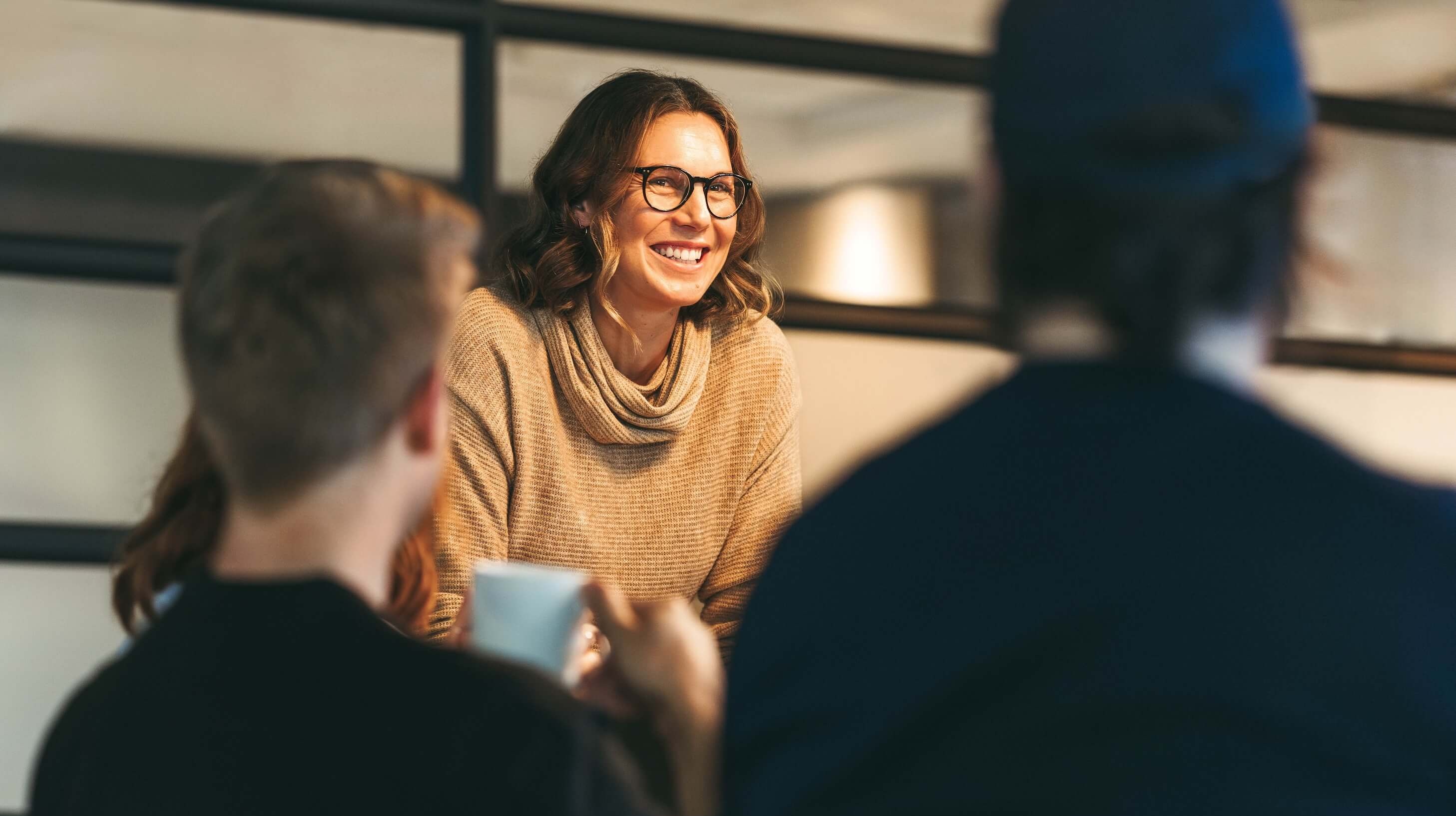 Woman discussing information with her team