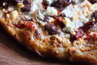 Vegan pizza with eggplant, and sun dried tomatoes