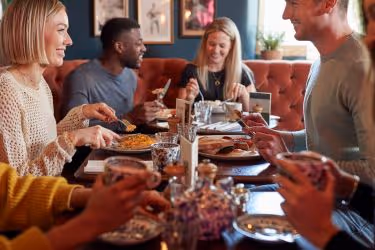 Friends having a meal together