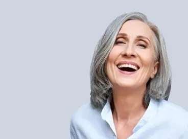 A model of All-on-4 dental implants showing how they fit on the gums