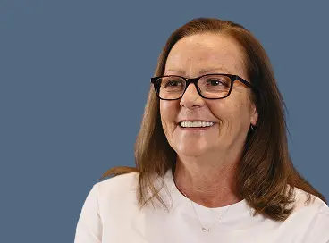 A model of All-on-4 dental implants showing how they fit on the gums