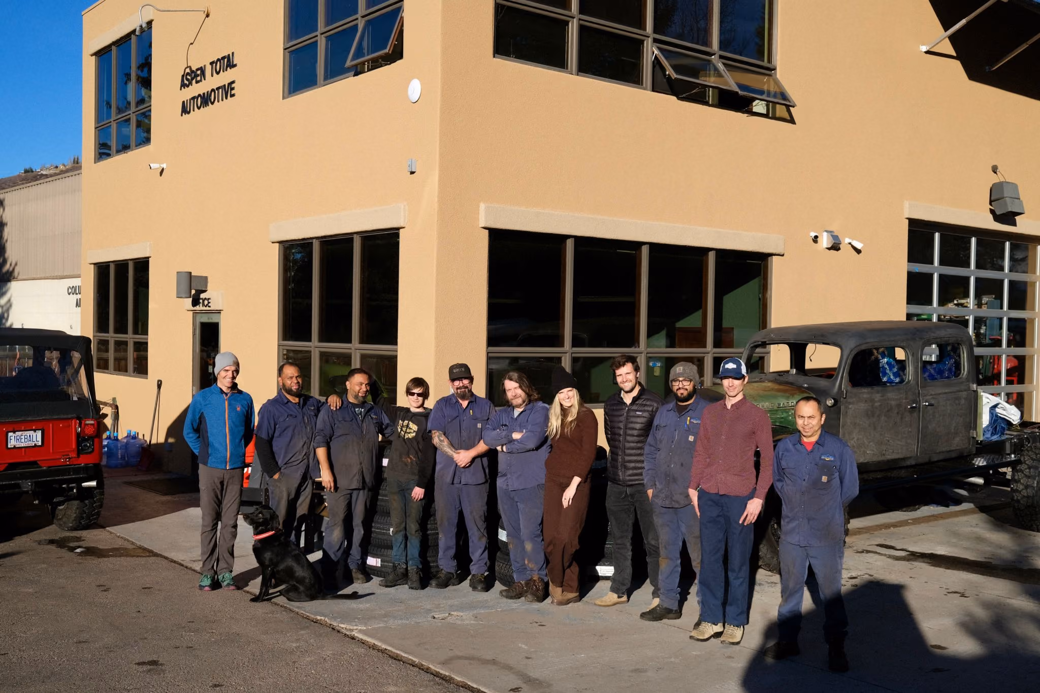 ATA employees in front of shop