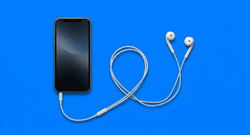 Phone and headset attendees use for silent theater with Wordly
