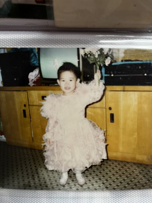 girl wearing pink princess dress with pink flowers
