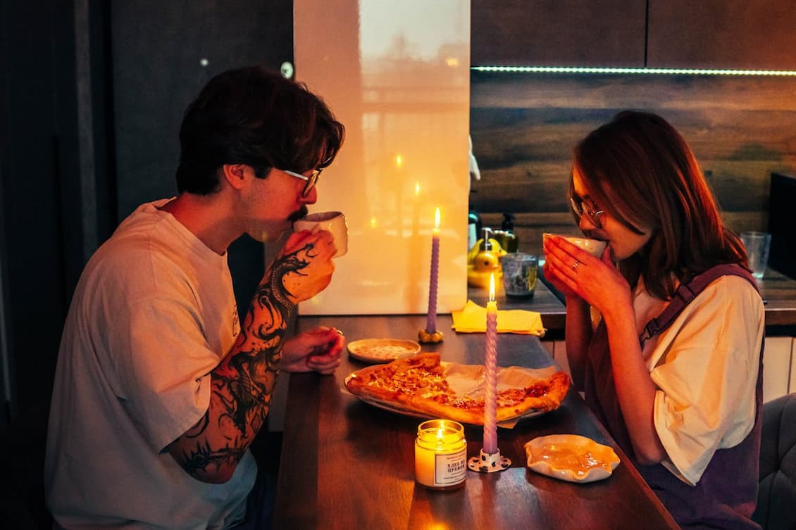 cozy-candlelit-dinner-with-pizza-and-drinks
