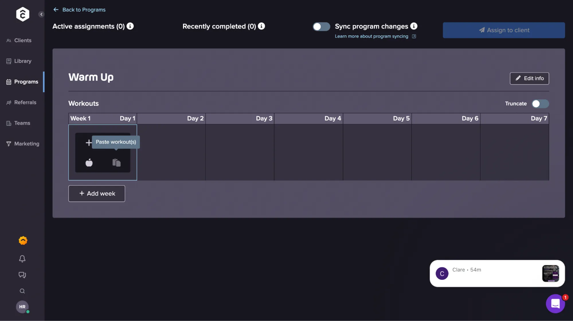 User interface for a workout program titled Warm Up with a weekly schedule showing Week 1 and Days 1 to 7, currently empty with options to add workouts, weeks, and toggle truncation.
