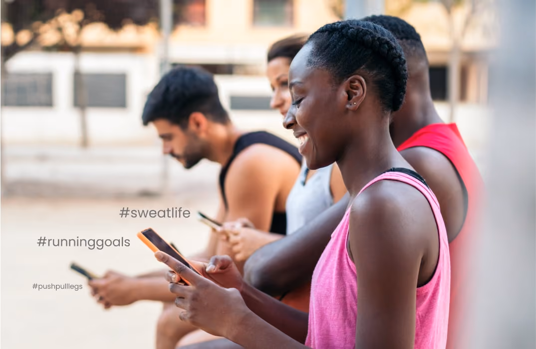 People using hashtags for working out such as #sweatlife, #runninggoals, and #pushpulllegs on their phones.