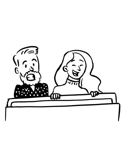 People sitting in the back seat of a roller coaster