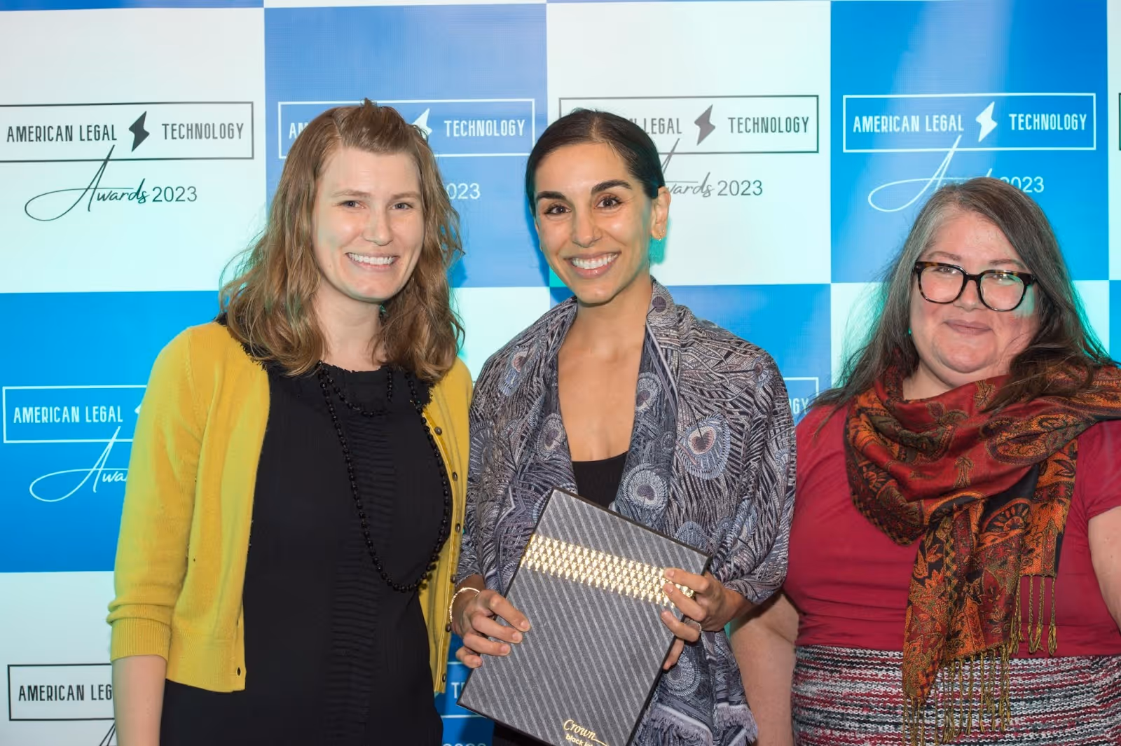 Moini pictured center with Madeline Buck to the left and Tricia Duffin to the right.