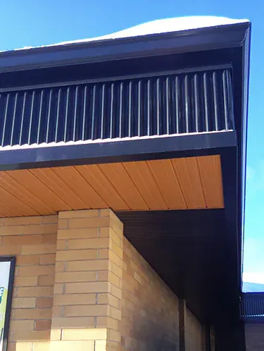 Corner of a metal clad roof
