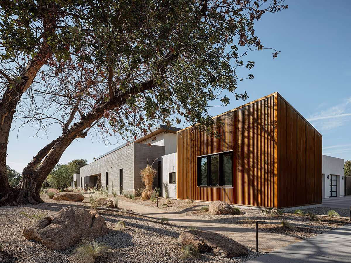 boardformed concrete and rusted corrugated metal modern desert house in Phoenix by The Ranch Mine
