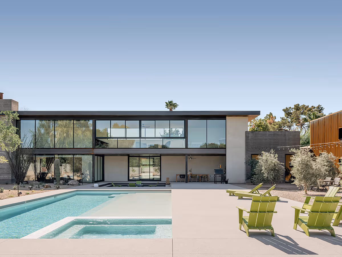 pool with large baja shelf and hot tub at a modern desert house in Phoenix by The Ranch Mine