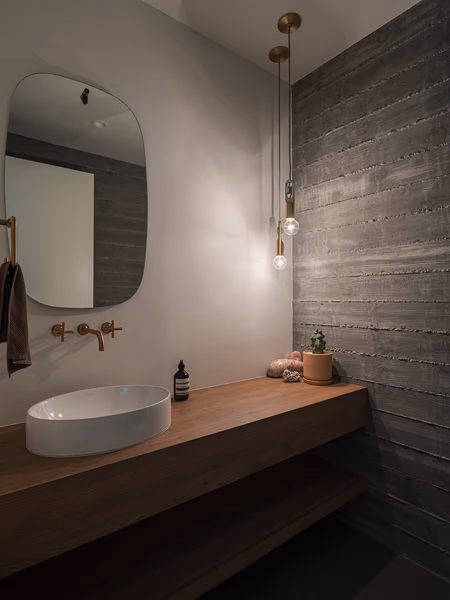 powder bath with concrete wall at a modern desert house in Phoenix by The Ranch Mine