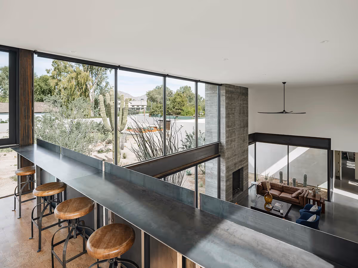 steel loft bar at a modern desert house in Phoenix by The Ranch Mine