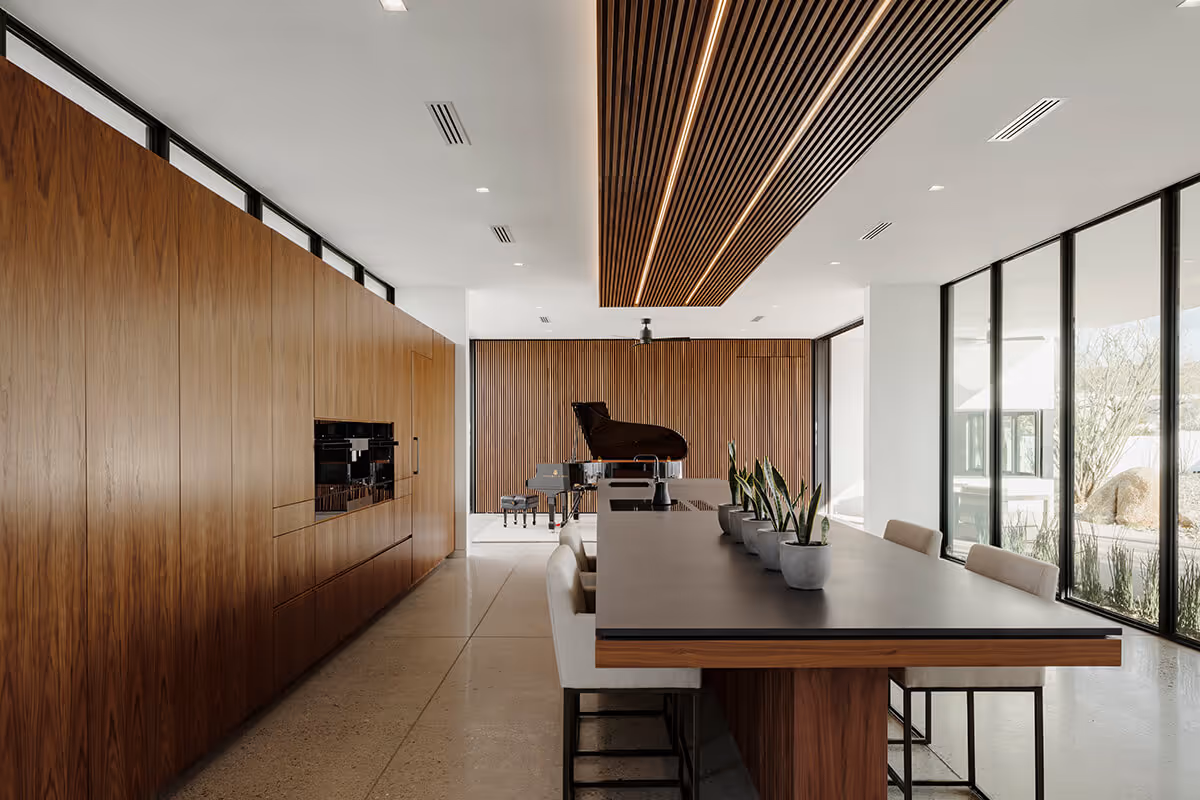 Walnut kitchen in a modern desert house by The Ranch Mine