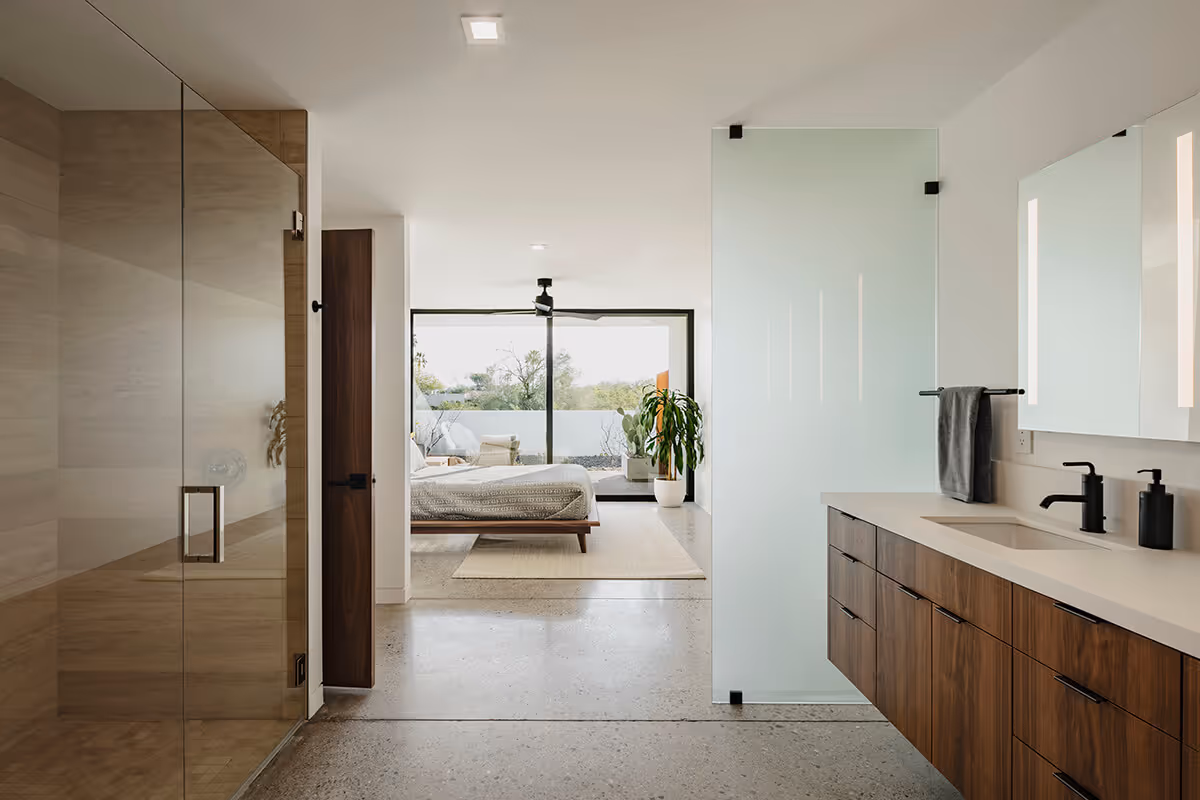 Guest house bath and bed  in a modern desert home by The Ranch Mine