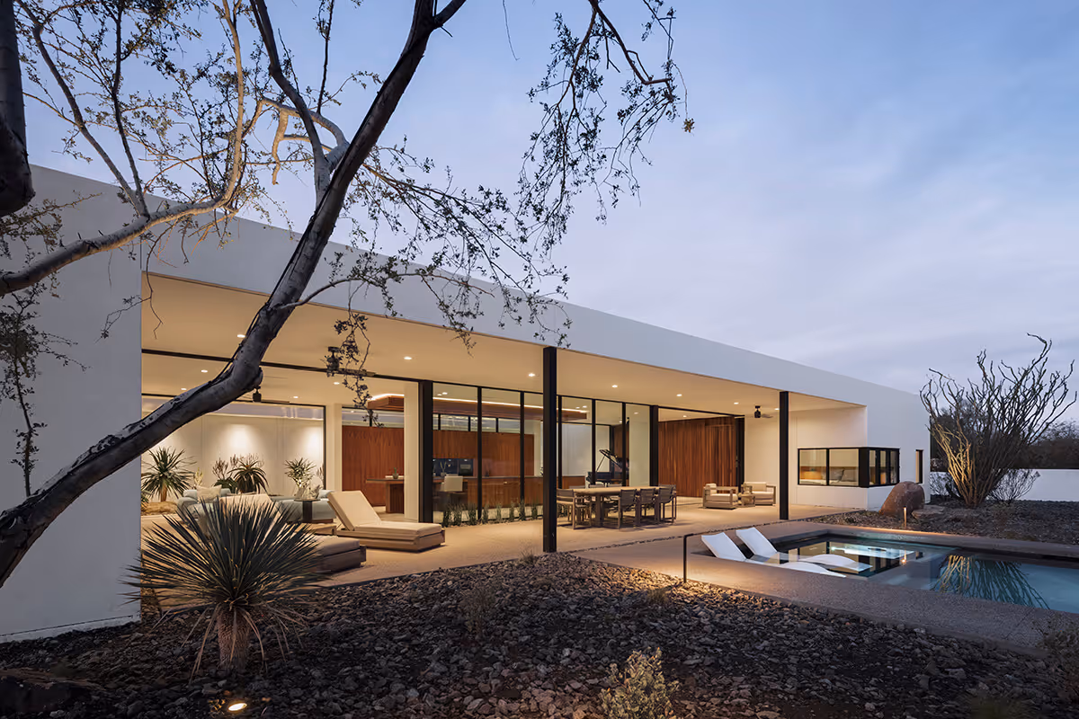twilight patio and pool in the desert in a modern desert house by The Ranch Mine