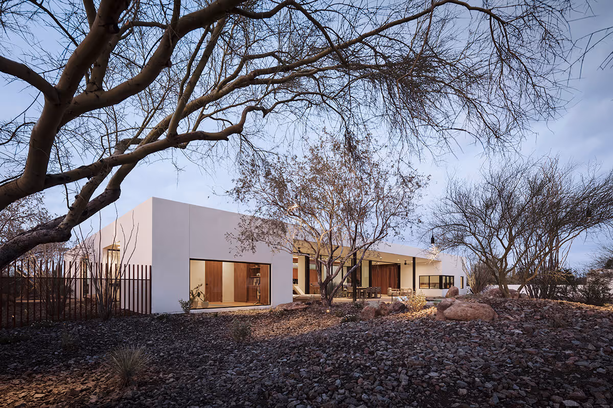twilight exterior of a modern desert house by The Ranch Mine