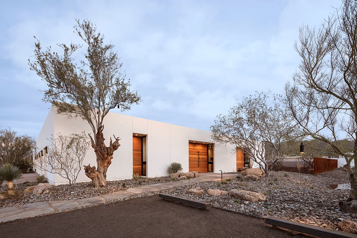 twilight exterior of a modern desert house by The Ranch Mine