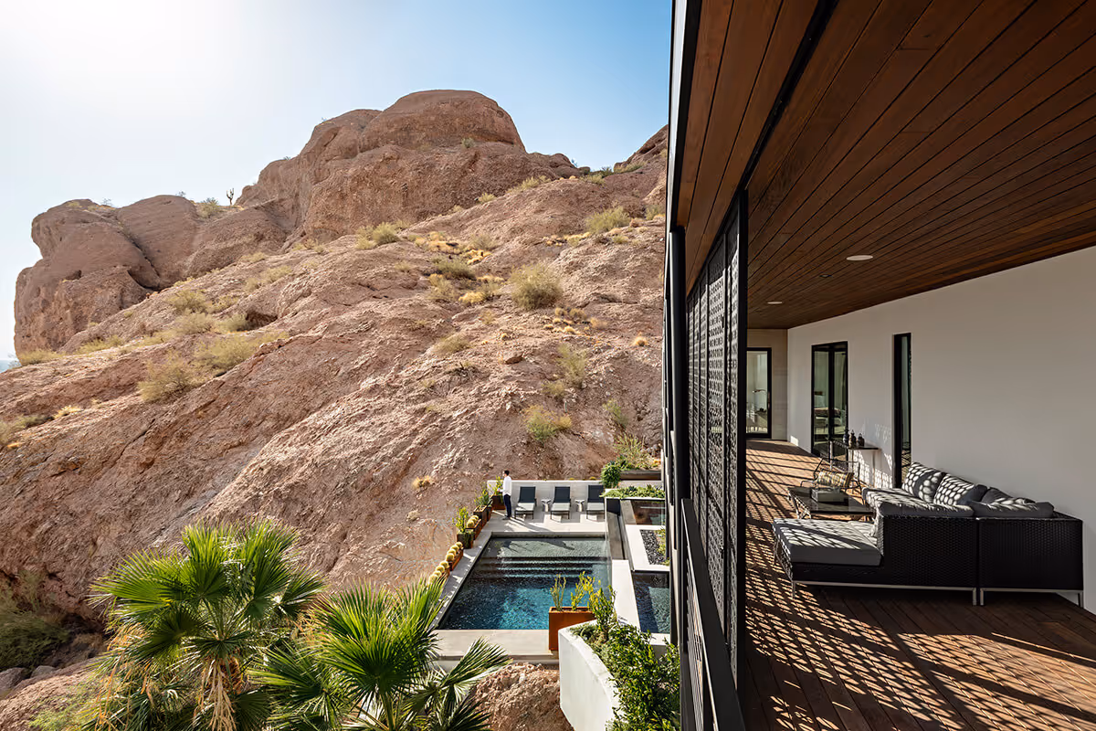 Modern home with a pool perched on a desert mountain in Phoenix by The Ranch Mine