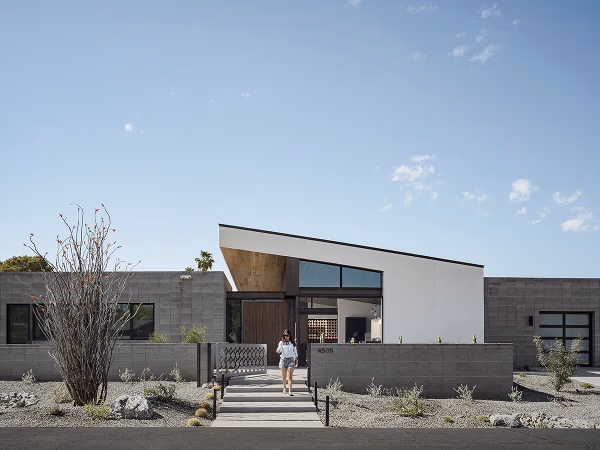 Concrete block, steel and stucco modern home in Phoenix by The Ranch Mine