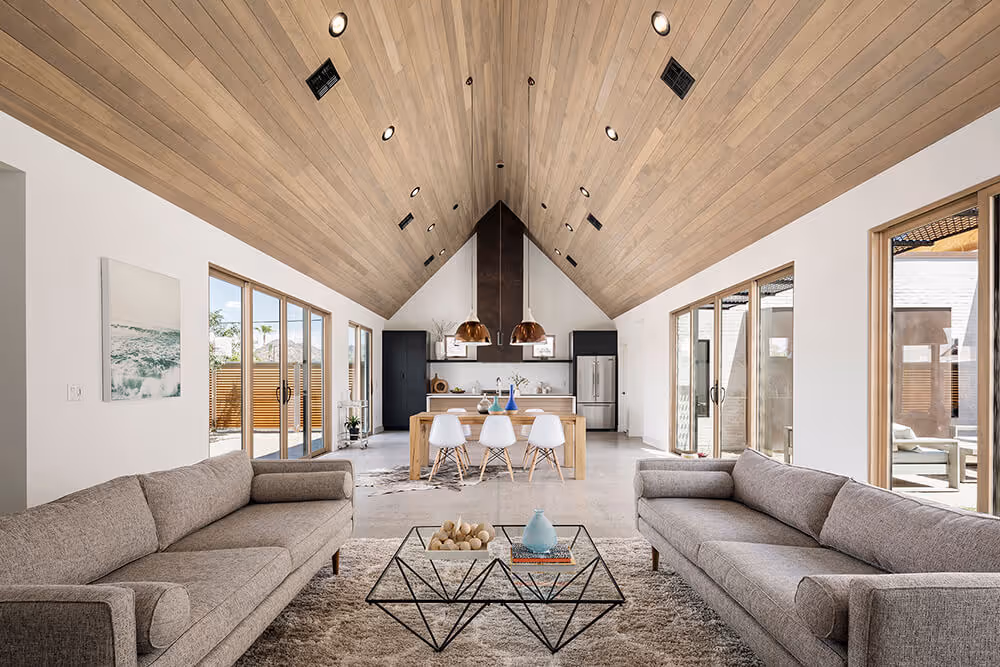 Great room with a wood ceiling at a southwest modern house by The Ranch Mine