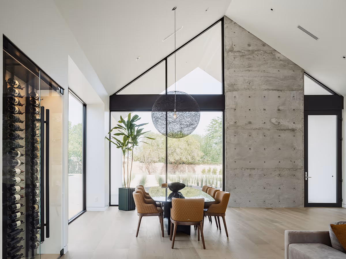 concrete wall and wine wall at modern gable house in Paradise Valley Arizona by The Ranch Mine