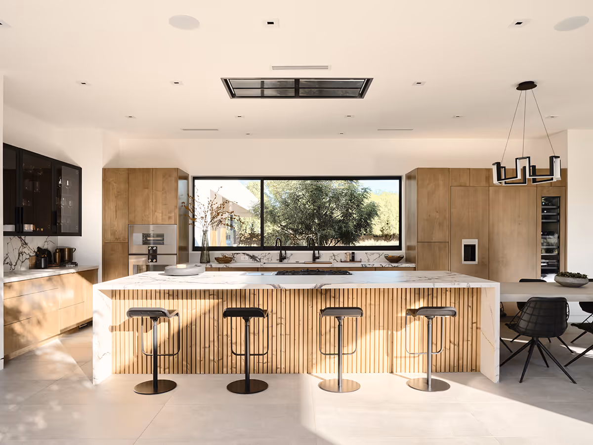 indoor outdoor kitchen at modern gable house in Paradise Valley Arizona by The Ranch Mine