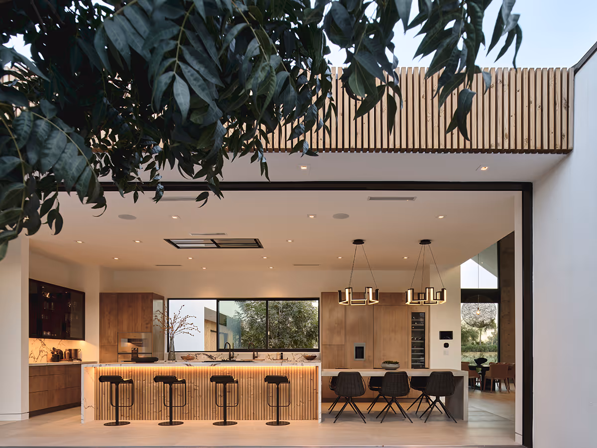 indoor outdoor kitchen at modern gable house in Paradise Valley Arizona by The Ranch Mine