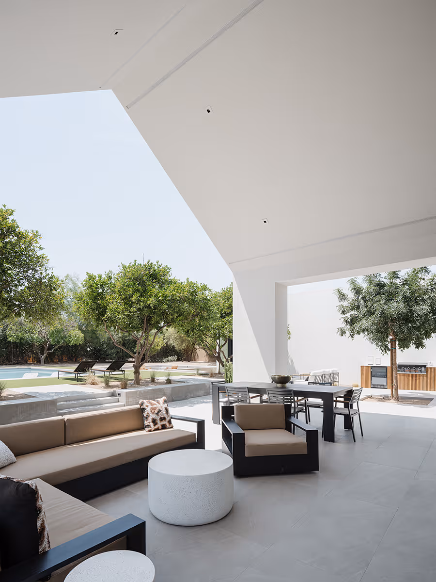 indoor outdoor living covered patio at modern gable house in Paradise Valley Arizona by The Ranch Mine